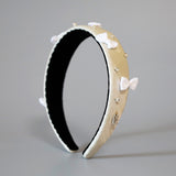 Thin Headband White Dot Ribbon