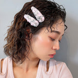 RE Hair Pin Pink Black Tweed